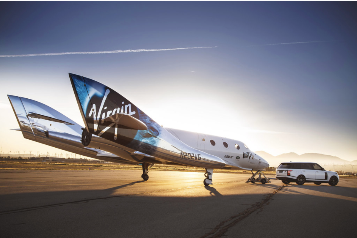  The model space ship called the WhiteKnightTwo, designed by Virgin Galactic, will be able to take six passengers up to space.