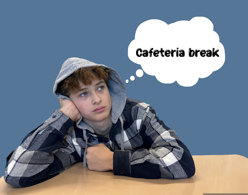 Blake Watkins ’26 sitting in class during his long period, wishing to take a cafeteria break with his class.