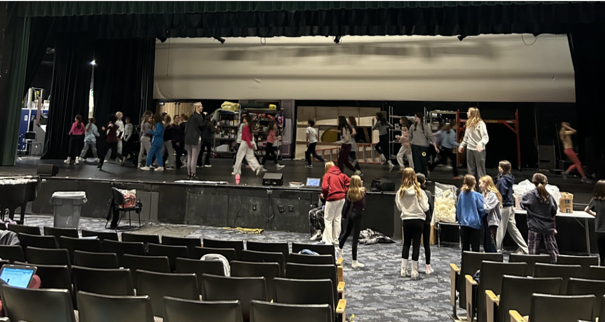 Choreographer Caitlin Roberts sets a group number, “I Just Can’t Wait to be King,” with the cast of “The Lion King Jr.” 