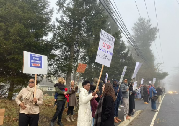 On Feb. 27, gathered on North Avenue across from Staples High School and Bedford Middle School to peacefully protest against racism and discrimination in Westport Public Schools. The protest lasted from 7:30-8:30 a.m.

