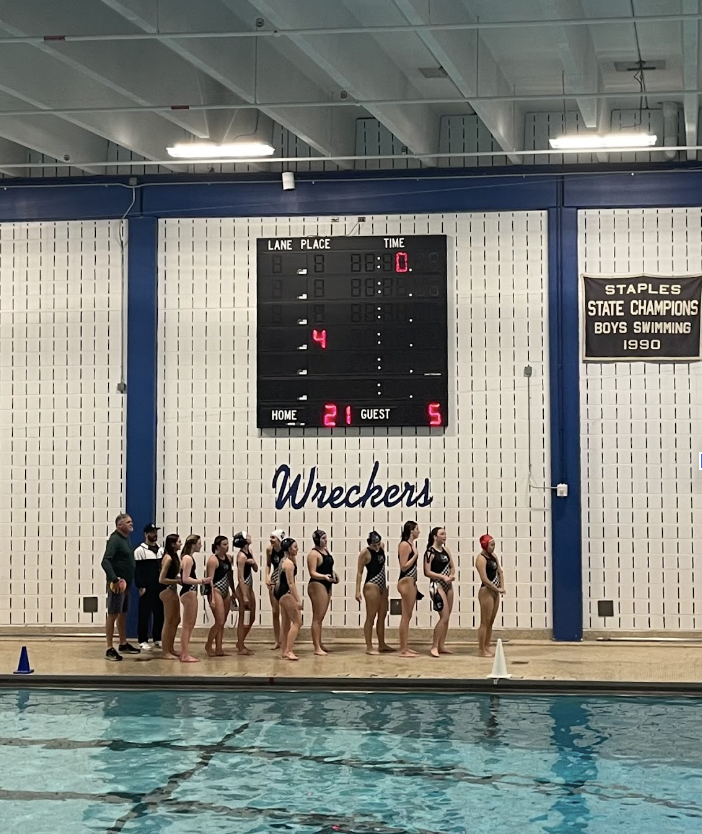 The Staples’ girls water polo team lines up before an impressive victory against Choate.