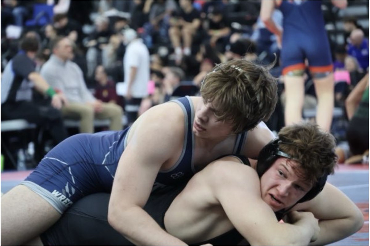 Damian Rousseau ’26 in his victorious match in the round of 16.