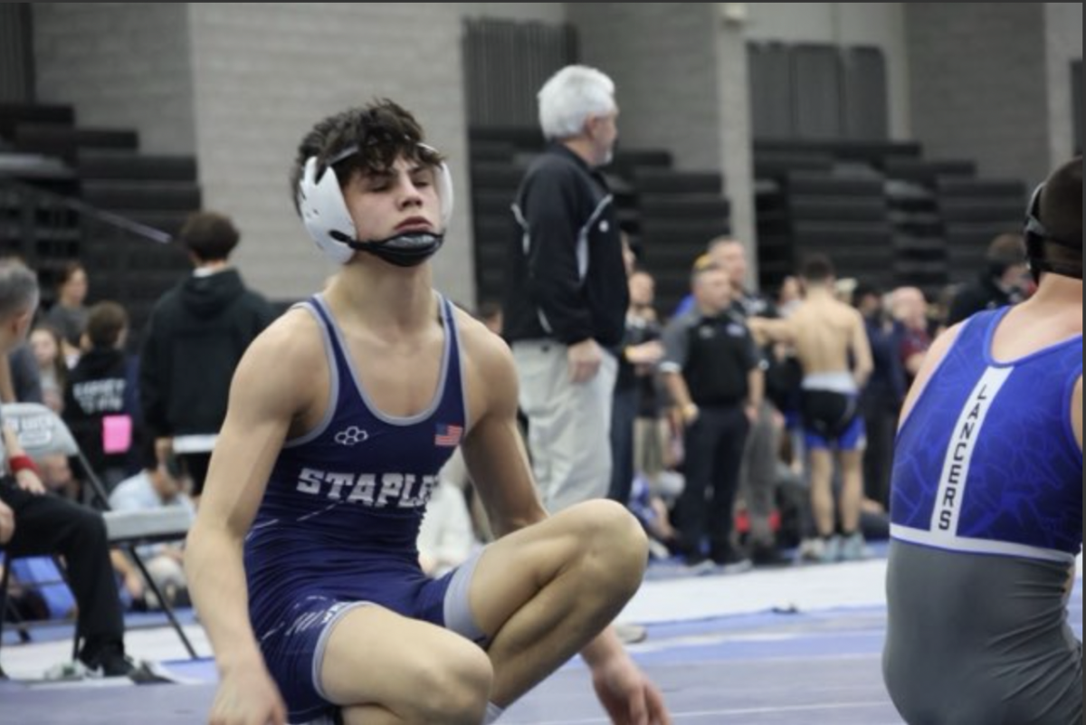 Gavin Donaldson '27 places 5th in the state at 120 lbs.
"He gave me trouble getting to my shots, but I was
able to make adjustments towards the end,"
 Donaldson said, refering to his quarterfinals match
which he won by pin.