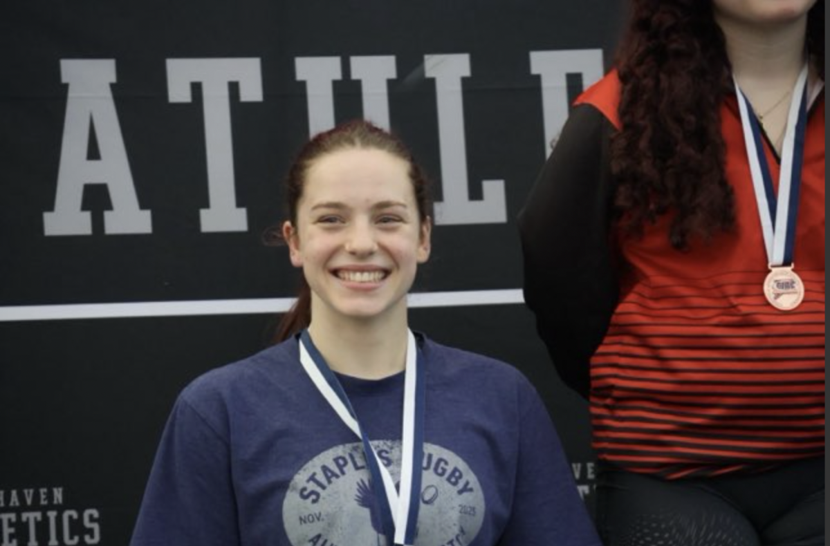 Amelia Guimond '28 makes history as the first female
Staples wrestler to place at the state tournament, placing
6th. "I'm really happy with my performance," Guimond said.