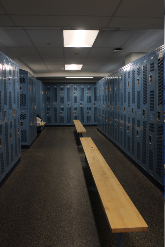 The girls' Physical Education locker room (directly above) has undergone multiple renovations. The girls’ locker room (bottom) has remained the same for many years, including the dim lighting.
