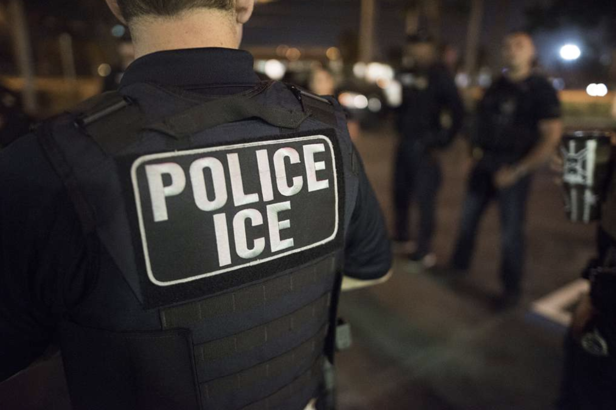 U.S. Immigration and Customs Enforcement (ICE) officers stand during their March 2018 operation, during which the officers made arrests in the state of Florida, Puerto Rico, and the U.S. Virgin Islands. ICE agents were expected to serve analytical and informational roles at the 2026 Winter Olympics in Italy.