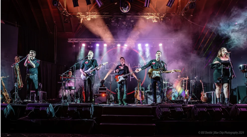 Michael Forgette (second from right) performs with his band Floydian Trip. The group sports a professional light and laser show.